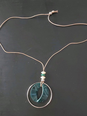 Necklace with green pendant
