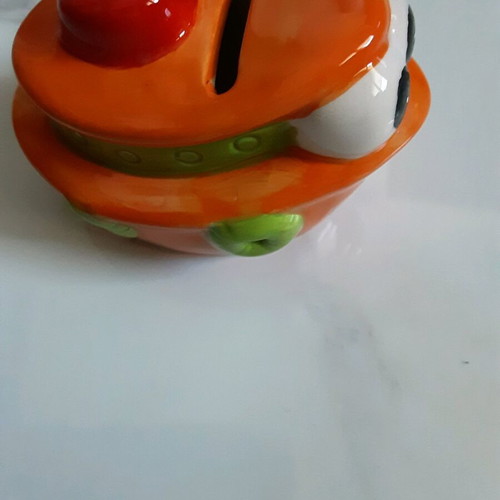 Small boat-shaped piggy bank like new