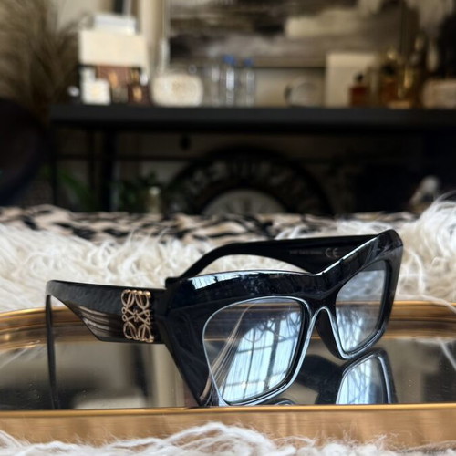 Cat Eye Sunglasses black like new with metal logo