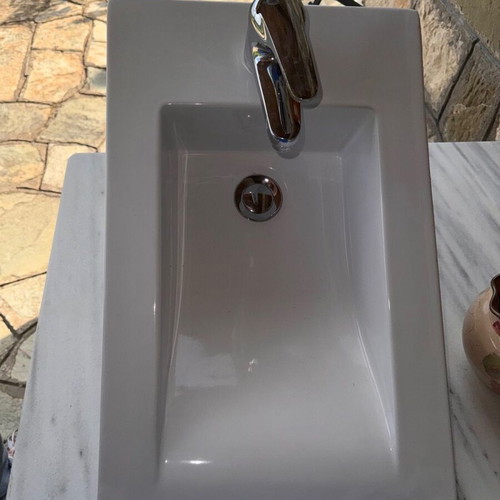 Porcelain small sink with built-in Ideal Standard faucet