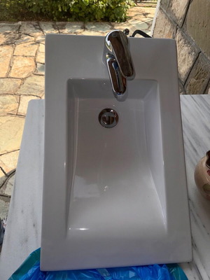 Porcelain small sink with built-in Ideal Standard faucet