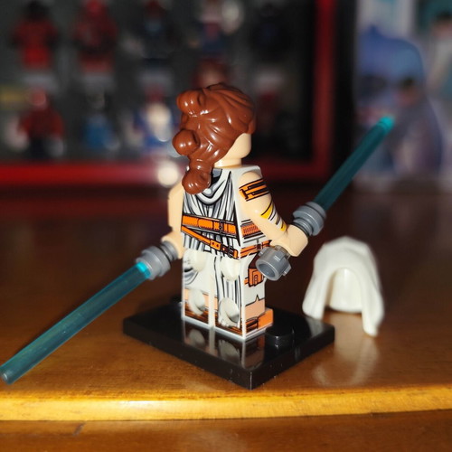 Rey figure like new with base, two blue lightsabers, hood