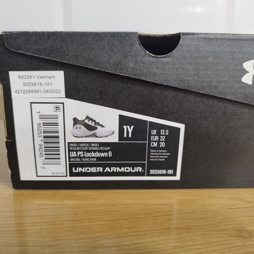 Under Armour basketball shoes kids size 32, black and white