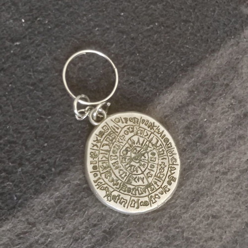 Phaistos Disc keychain used, in excellent condition