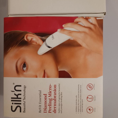 Diamond peeling microdermabrasion device like new with replacement pads