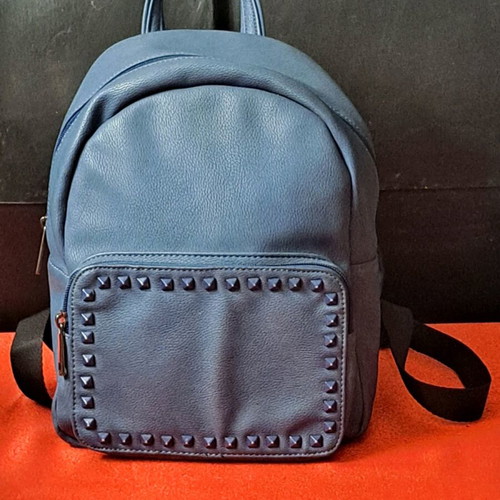Women's blue backpack like new with studded design