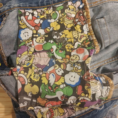 Levi’s 501 women's pants like new, collectible Super Mario edition