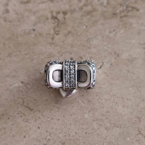 Pandora charm silver 925 like new with bow and heart zirconia