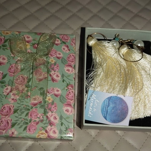 Earrings used with white tassels