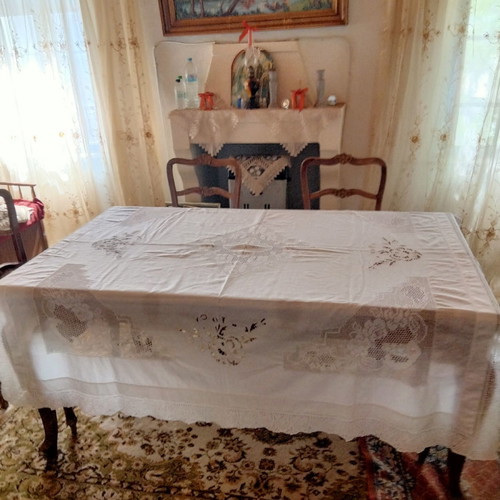 Handmade tablecloth used with knitted corners, lace and cutwork