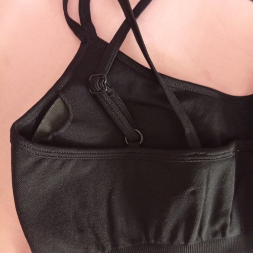 Sports top with chest padding and adjustable cross straps, new, size M-L