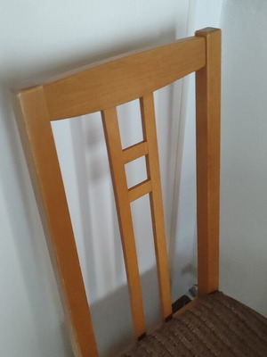 Wooden dining chair with fabric seat