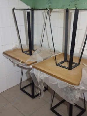 Professional kitchen equipment used, table and chairs