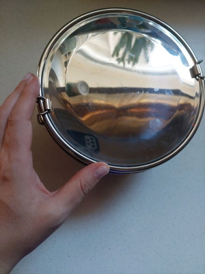 Metal food container used with hook for transport