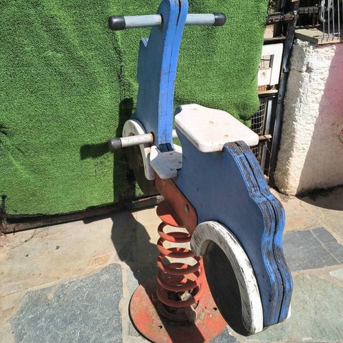 Rocking Ground Toy Motorcycle with Spring and Iron Base used, outdoor