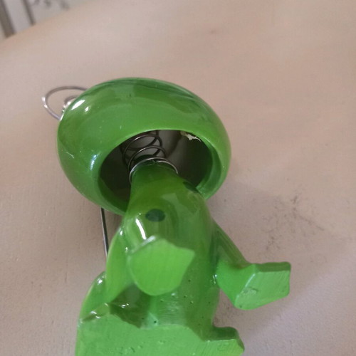 Decorative frog used with spring on head