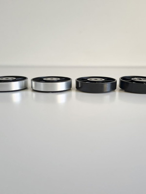 Set of 4 plastic Hi-Fi device feet, 2 silver & 2 black, 55x13 mm