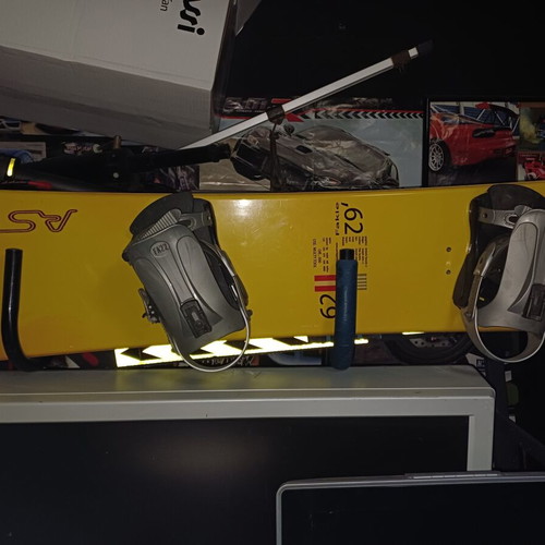 Snowboard used with bindings
