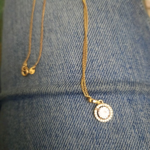Pendant used in gold tone with stone made of steel