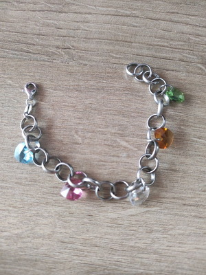 Silver 925 bracelet like new with multicolored dangling zircon hearts