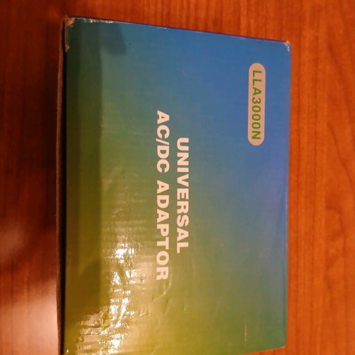 Universal AC/DC adapter new, adjustable power supply with multiple plugs