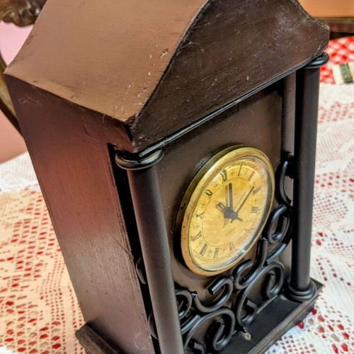 Vintage decorative tabletop clock with wooden and wrought iron details