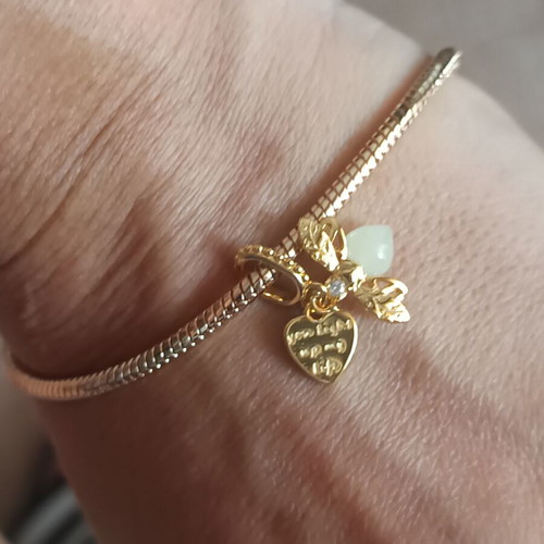 Charm firefly that glows in the dark, new, copper with silver plating