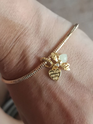 Charm firefly that glows in the dark, new, copper with silver plating