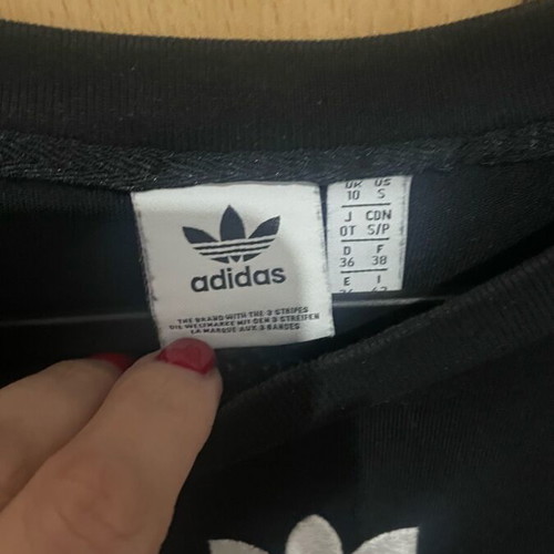Adidas t shirt black like new with embossed chest logo