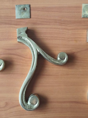 Brass carved supports set of 3 used, heavy pieces