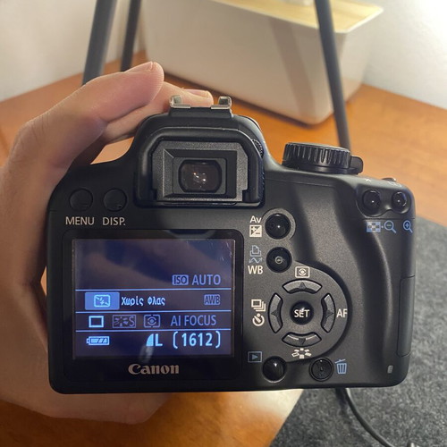 Canon EOS 1000D DSLR with EF-S 18-55mm IS lens, used