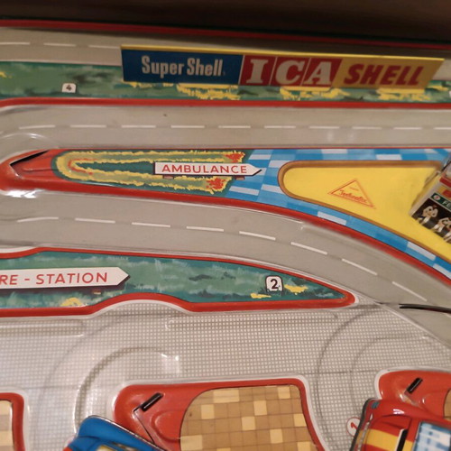 Race track toy with 3 wind-up cars used, 1960, metal