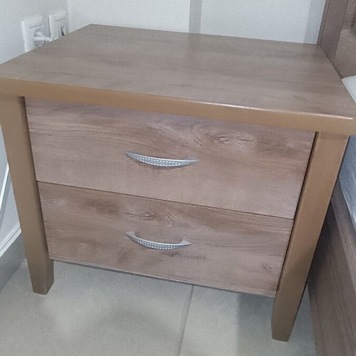 Wooden bedroom set with semi-double bed, nightstand, and chest of drawers