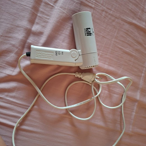 Travel hairdryer like new, dual voltage 230/115V