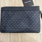 Michael Kors men's wristlet bag like new, black and gray