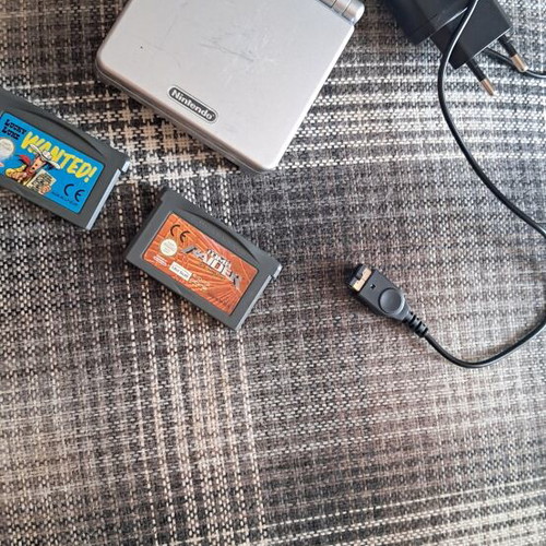 Game Boy Advance console with 2 games