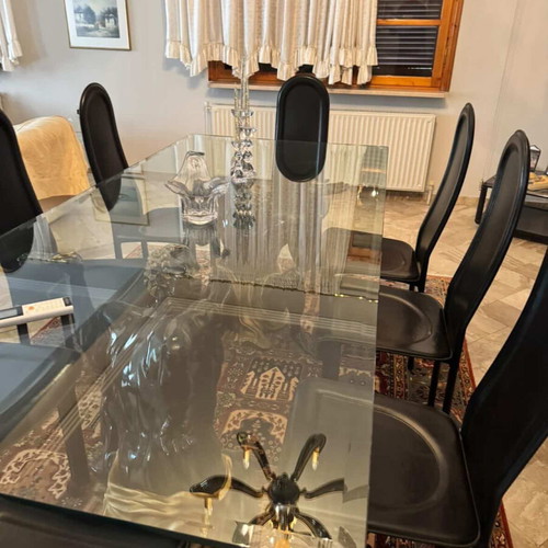 Dining table with 8 leather chairs and sideboard like new