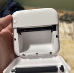Mini printer like new with 6 rolls, cable and box
