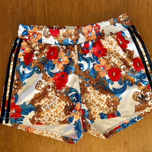 Adidas women's floral set like new, sizes 38 and 40