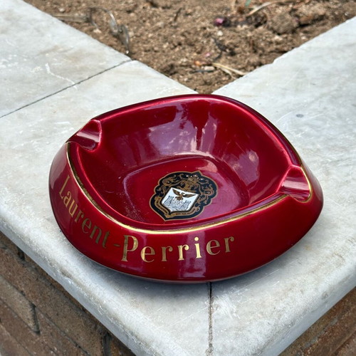 Laurent-Perrier ashtray used, red porcelain with gold details