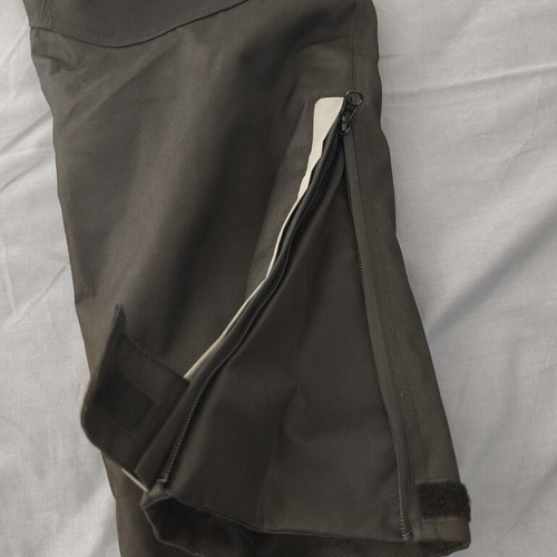 Motorcycle pants large, new, waterproof with knee protectors and vents