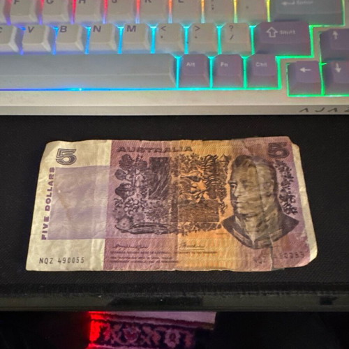 Australia 1974 5 dollar note used with taped tear