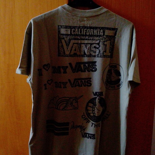Vans khaki blouse with designs small like new