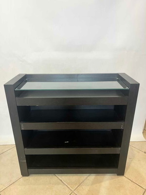 Wooden furniture with glass surface and two shelves on wheels used