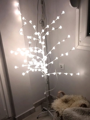 Decorative tree with roses used with lights and metal base