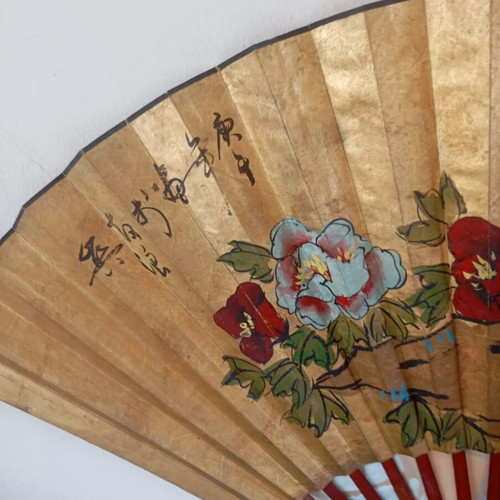 Large decorative Asian art wall fan with peacock feathers and peonies, vintage