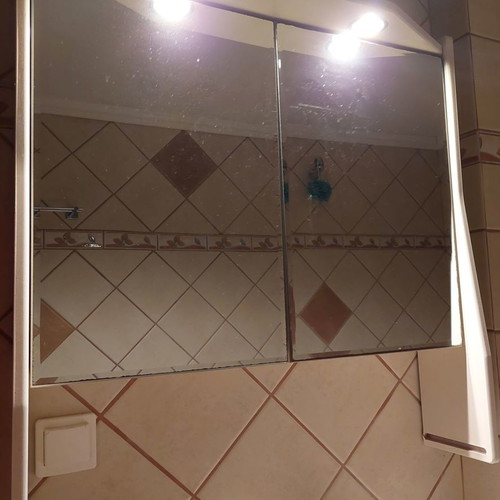 Bathroom mirror cabinet used with two shelves and glass shelf