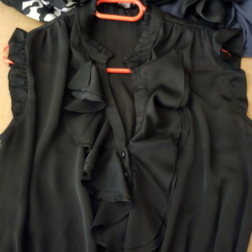 Black satin blouse like new with neckline opening, sizes L/XL