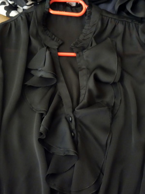 Black satin blouse like new with neckline opening, sizes L/XL