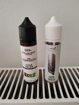 Steam City Flavour Shot Cola Twist and Omerta Carat fruity tobacco e-liquids like new